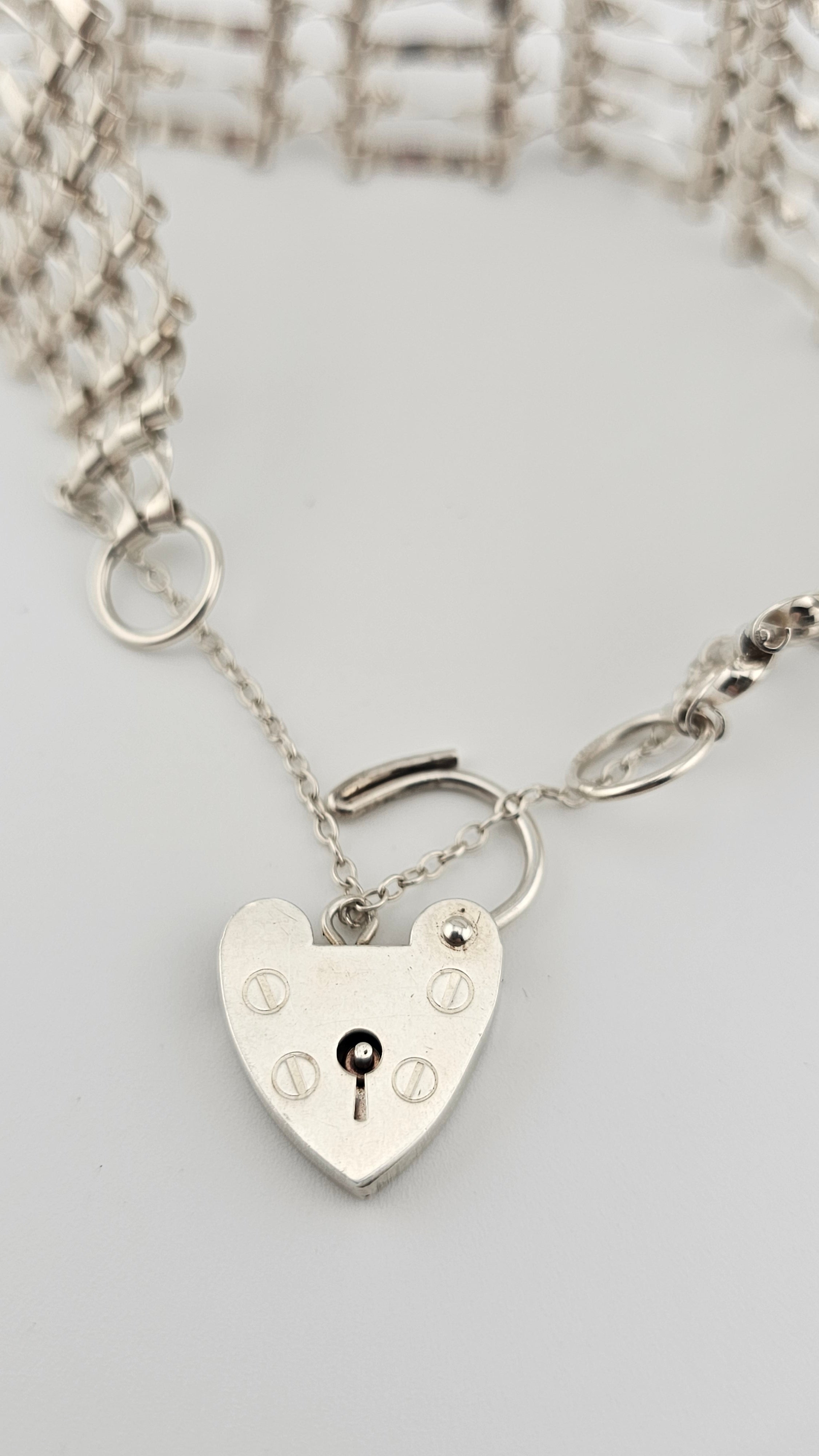 Vintage 925 Sterling Silver Gate Bracelet Featuring Heart Padlock Clasp