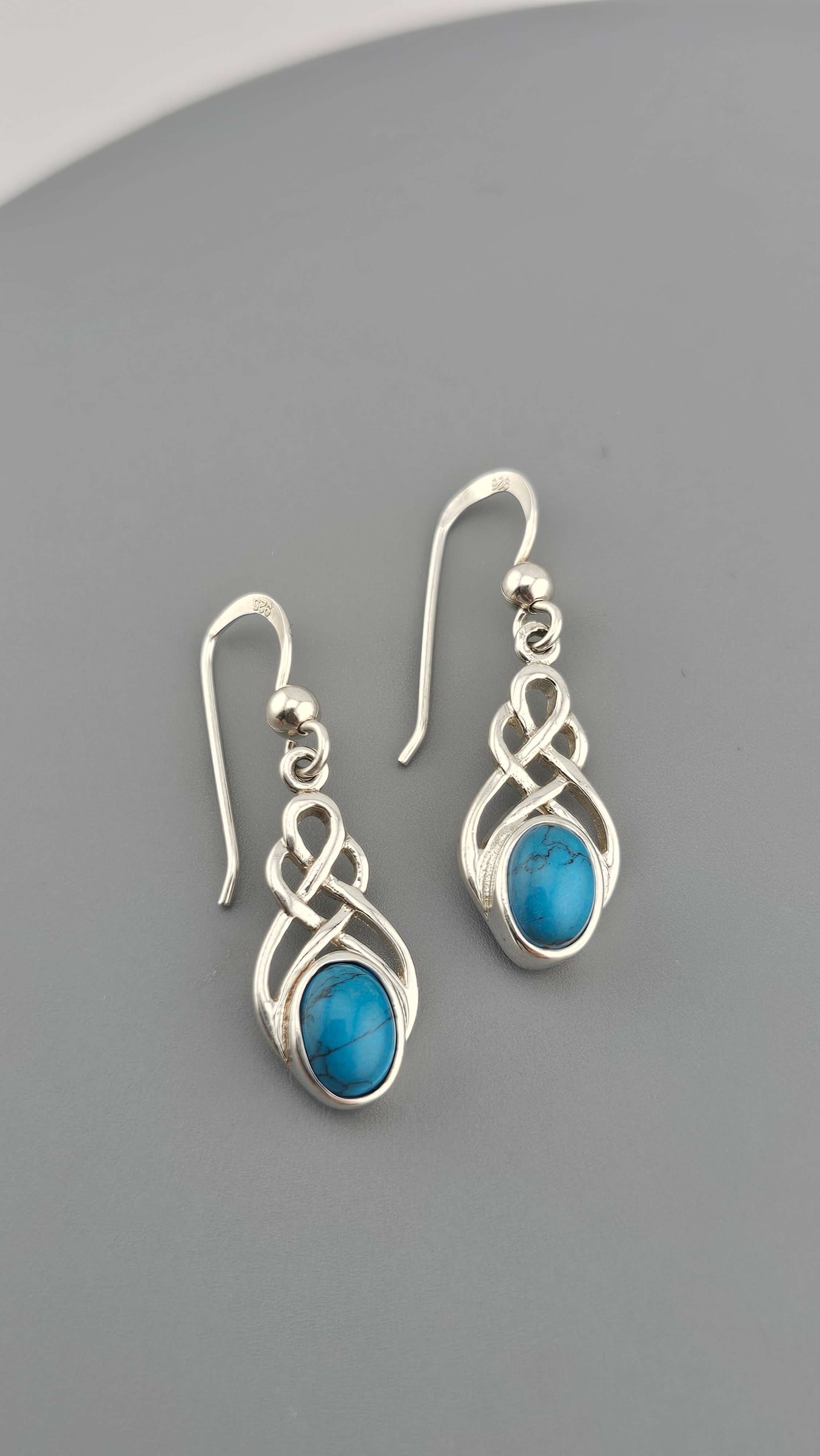 Sterling Silver Celtic Knot Drop Earrings with Turquoise stones.