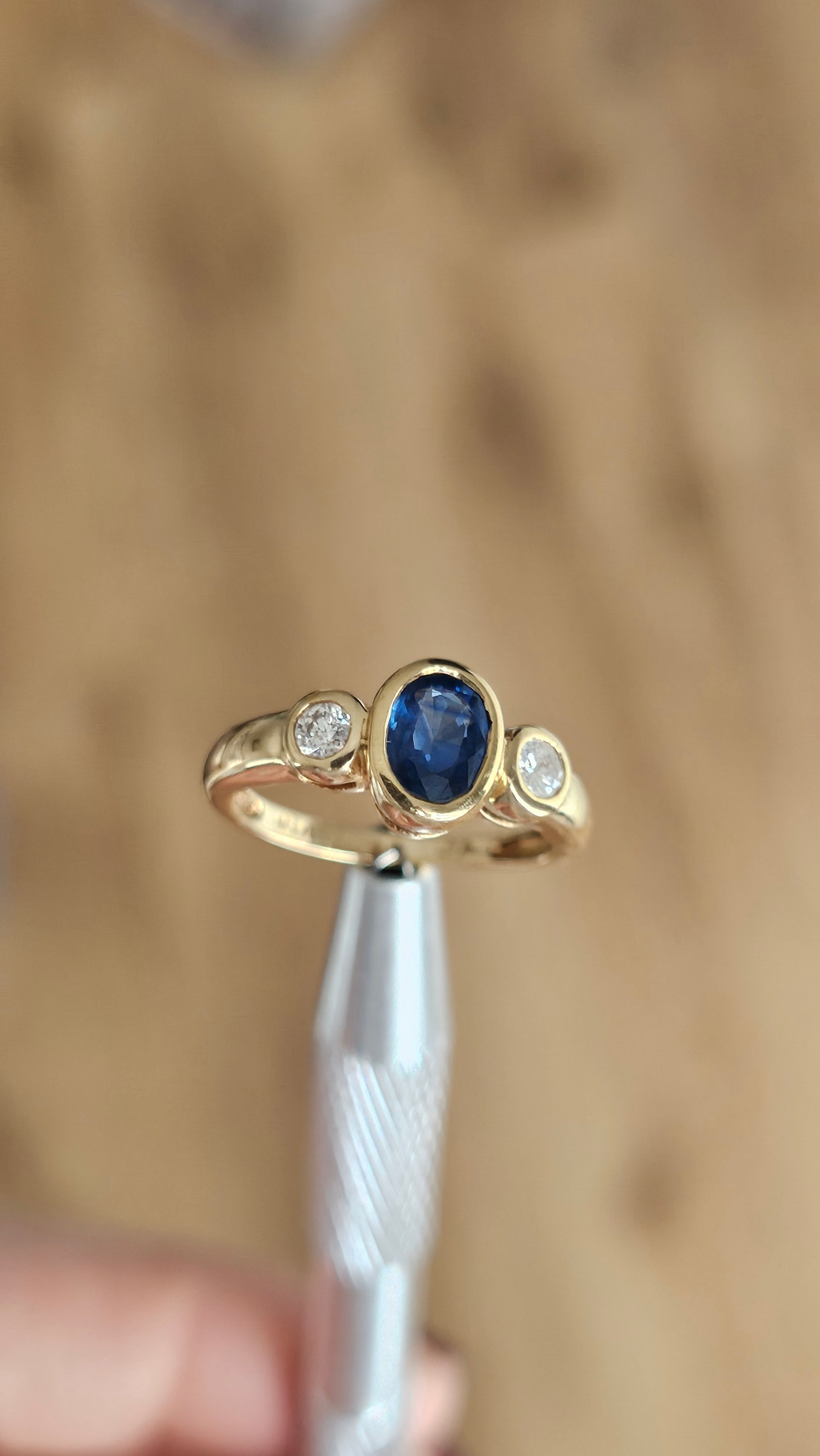 Bezel set 0.85ct Natural Sapphire and 0.20ct Natural Diamonds in 18ct Yellow Gold ring