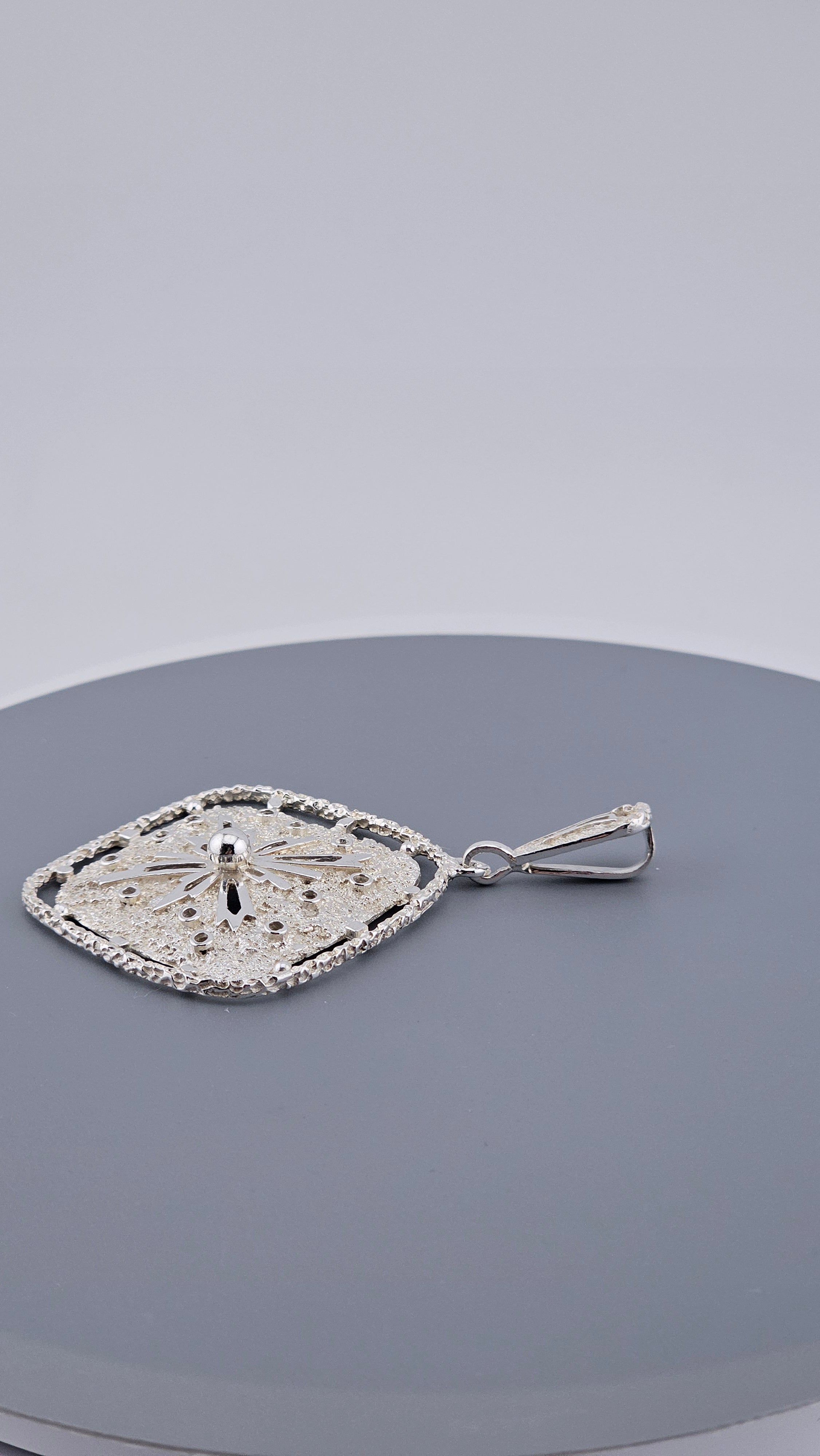 Vintage 925 Sterling Silver Textured Starburst Pendant