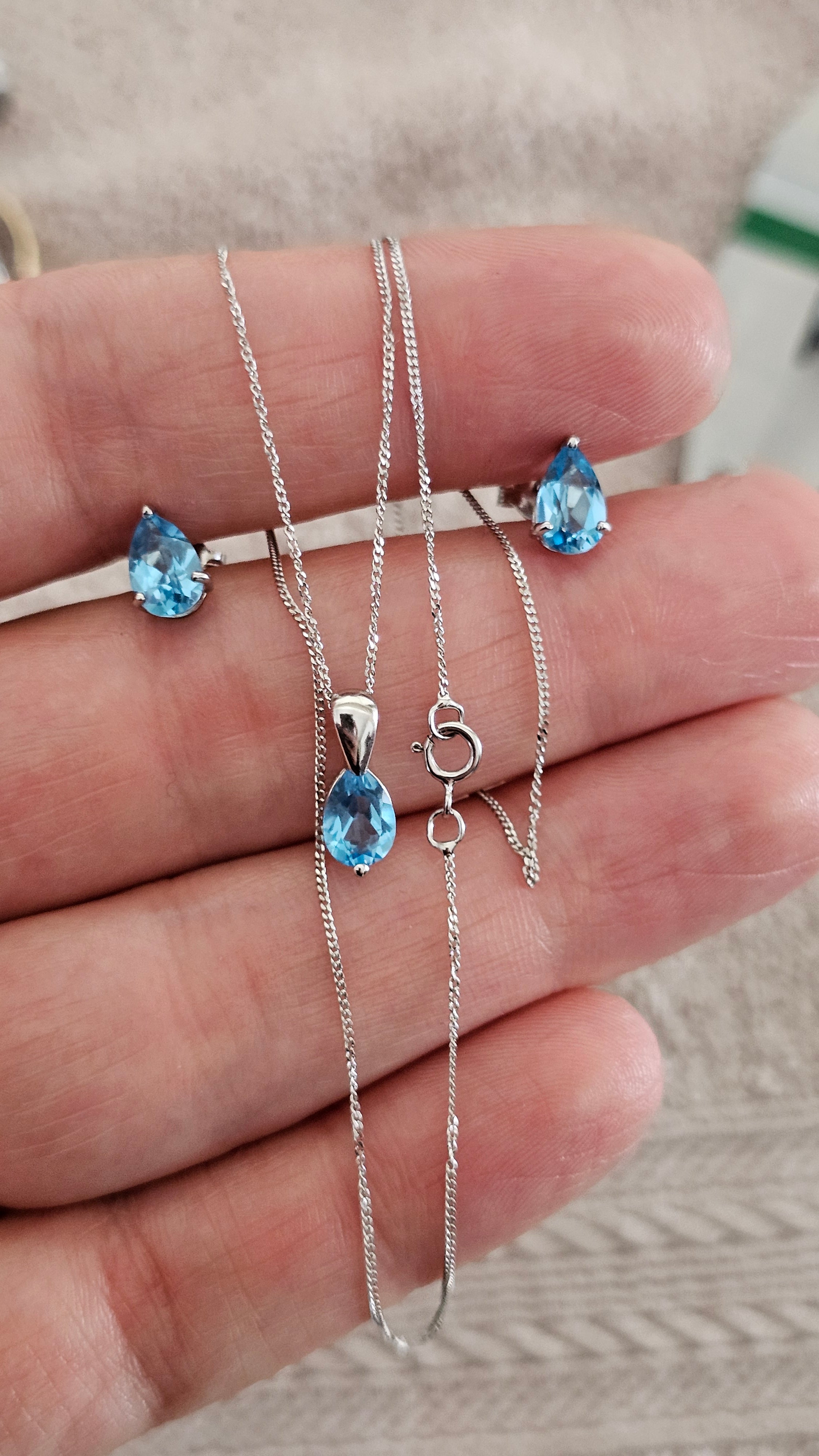 Elegant 9ct White Gold and Pear Cut Blue Topaz Jewellery Suite – Pendant & Earrings