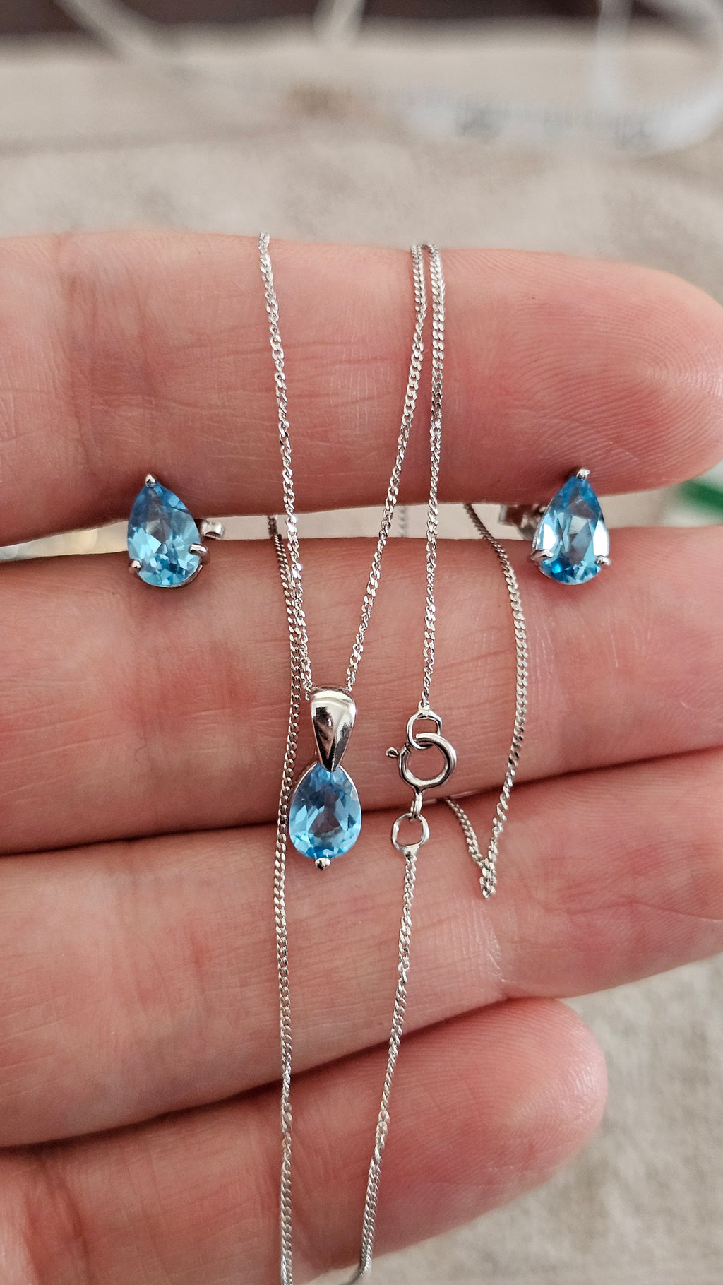 Elegant 9ct White Gold and Pear Cut Blue Topaz Jewellery Suite – Pendant & Earrings