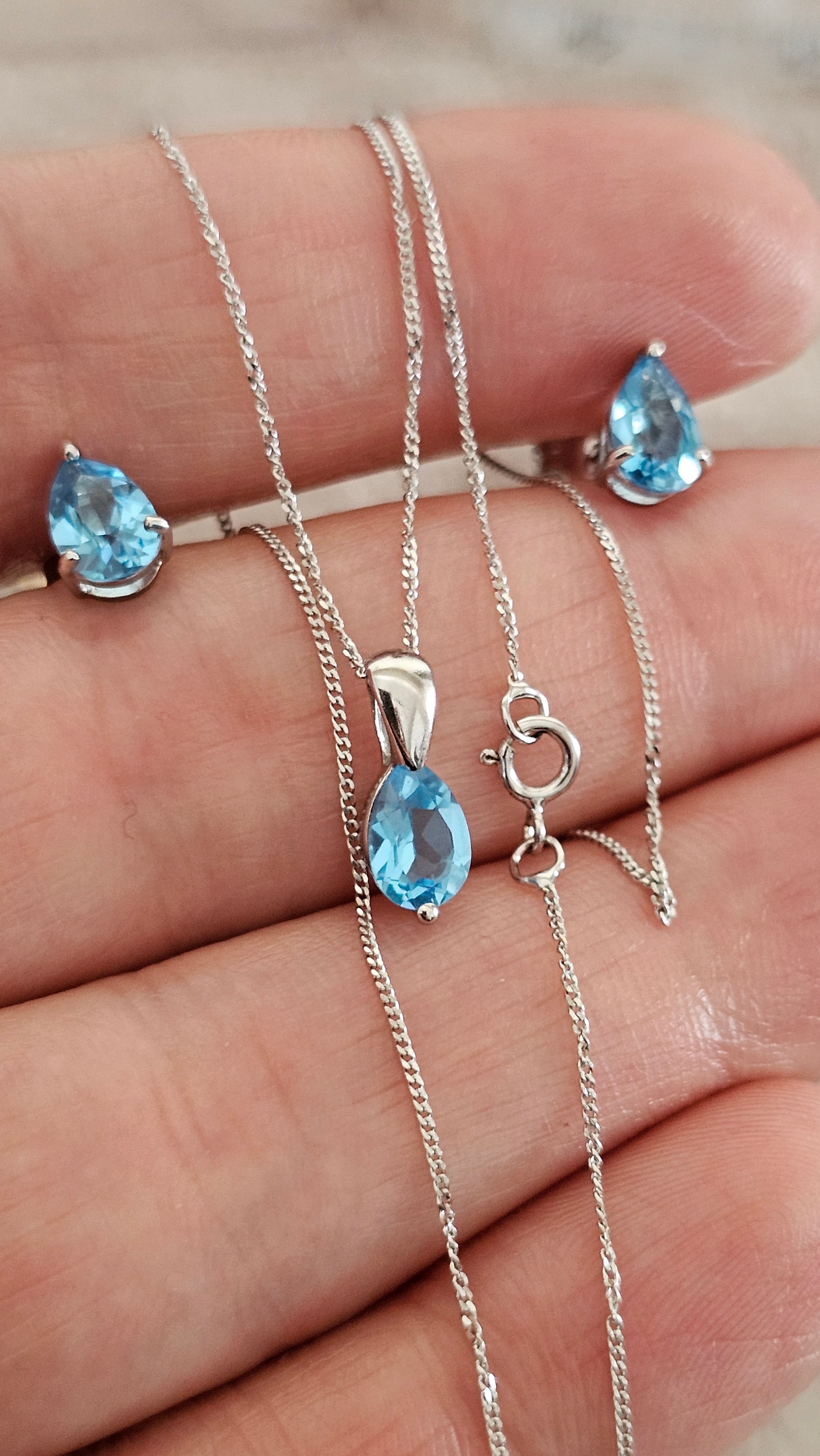 Elegant 9ct White Gold and Pear Cut Blue Topaz Jewellery Suite – Pendant & Earrings