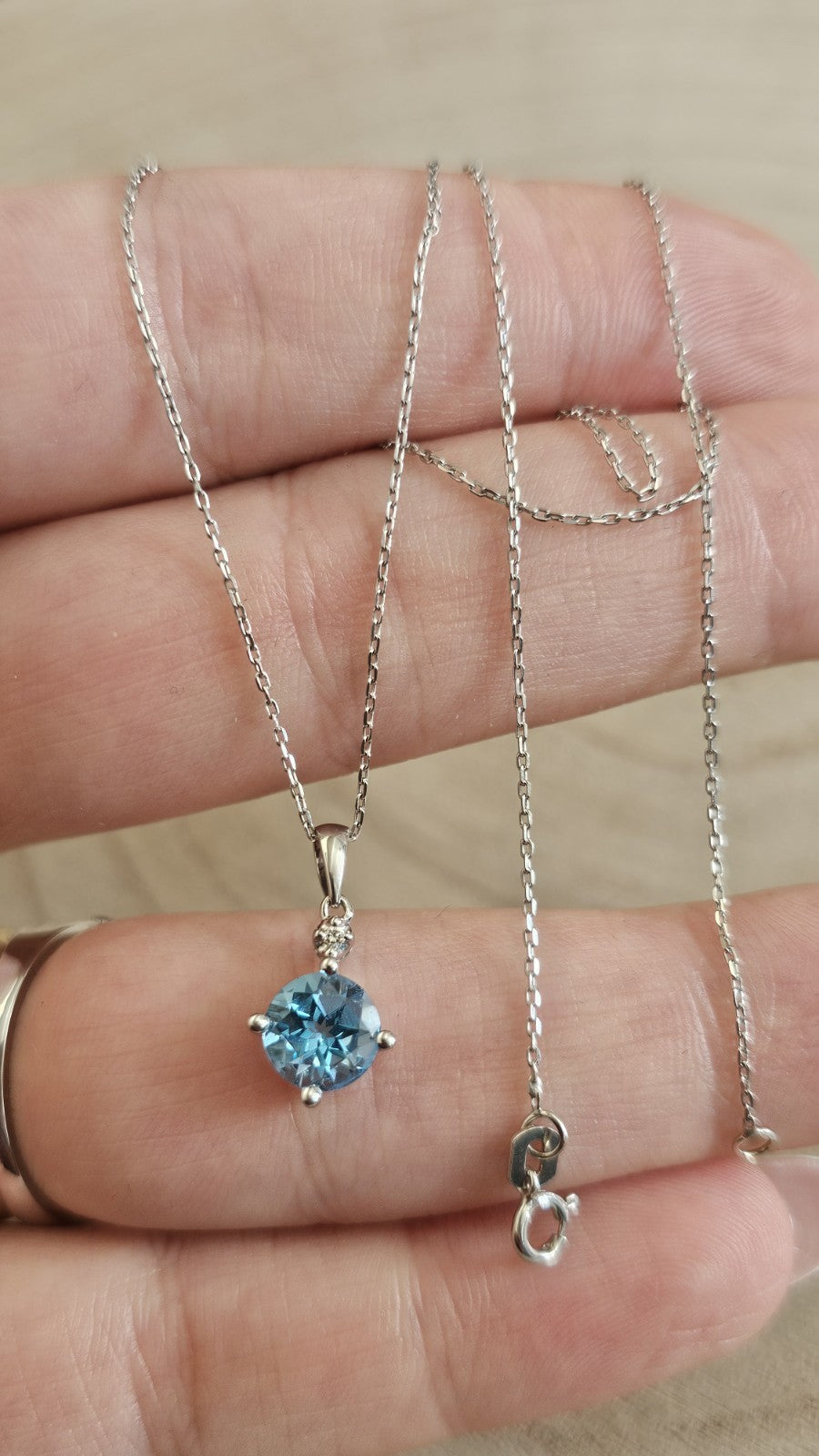 9ct White Gold Natural Blue Topaz & Diamond Pendant Necklace – 18 Inches