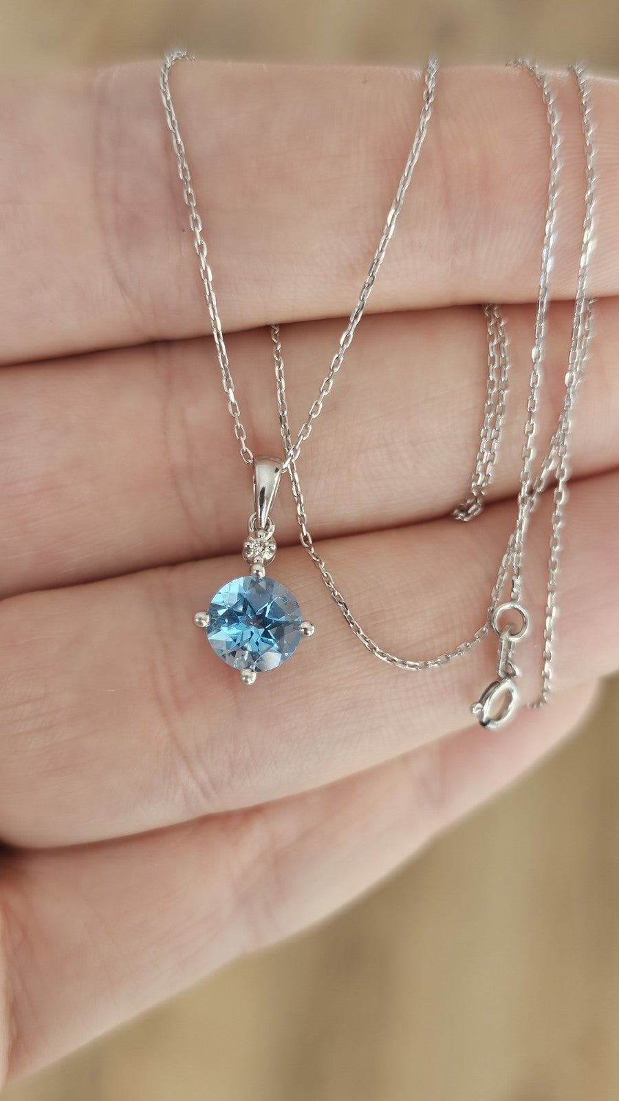 9ct White Gold Natural Blue Topaz & Diamond Pendant Necklace – 18 Inches