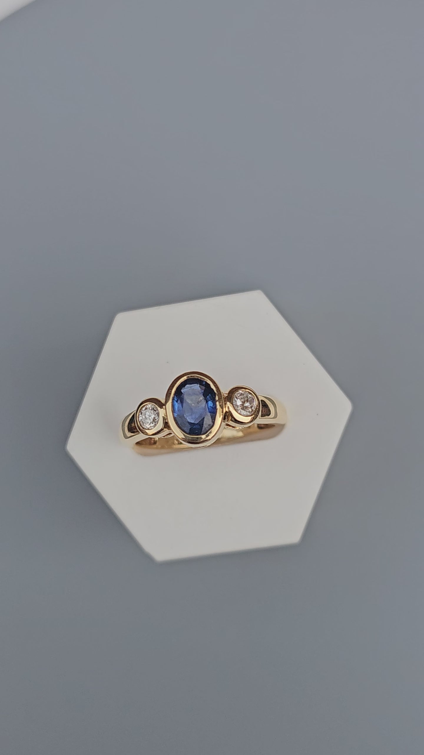 Bezel set 0.85ct Natural Sapphire and 0.20ct Natural Diamonds in 18ct Yellow Gold ring